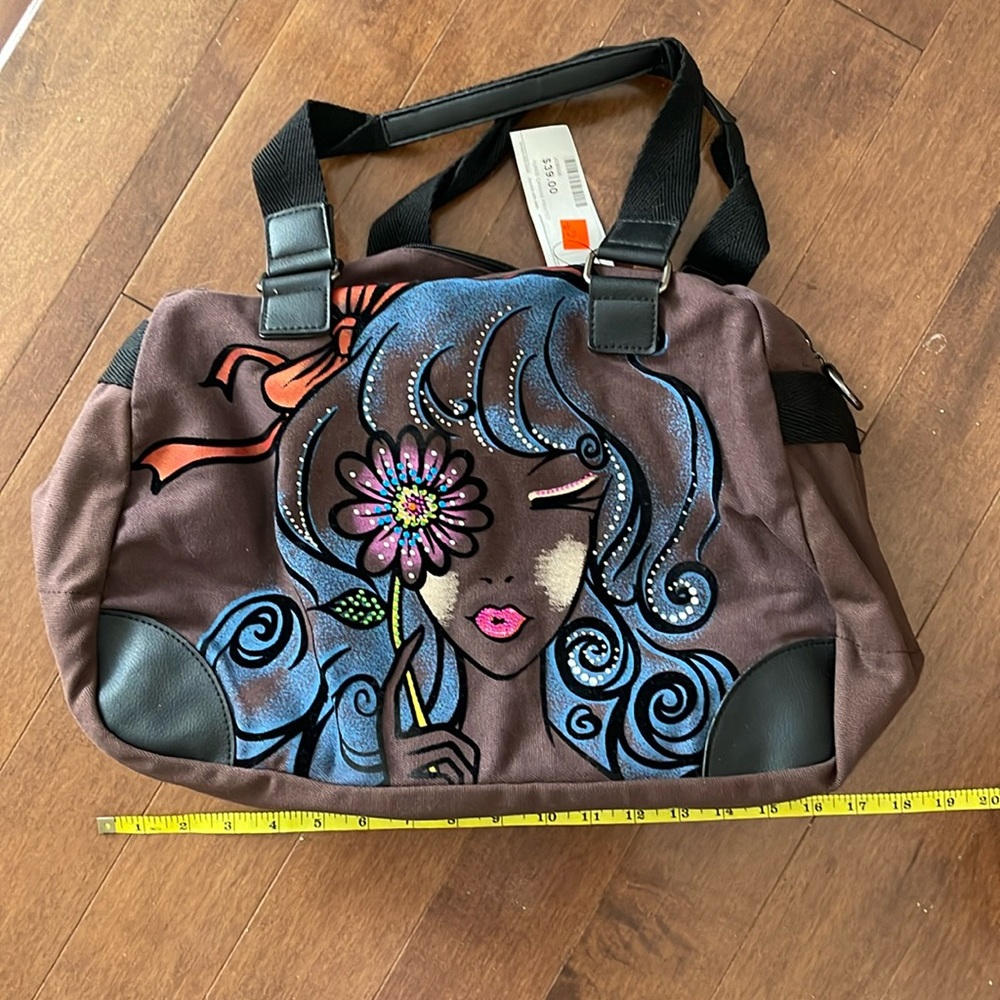 Brown canvas bag with fun printed and beaded front